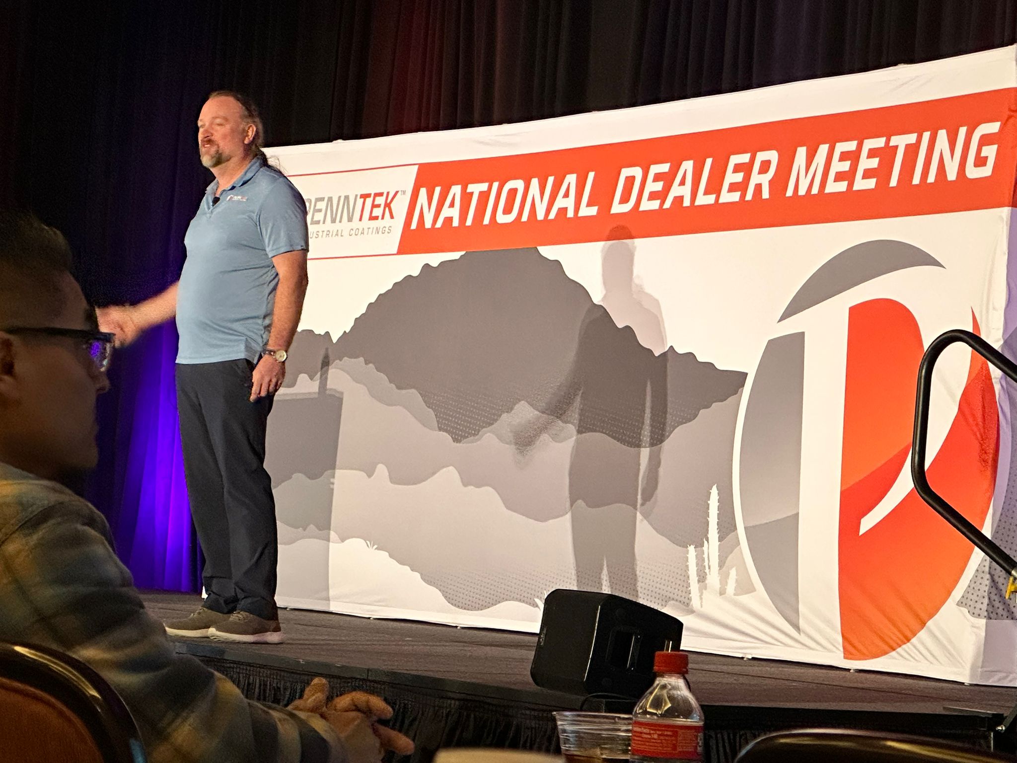Powrful event creative displayed at a national dealer meeting